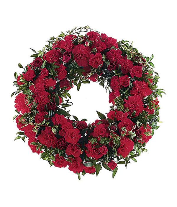 Warm Regards Wreath of red flowers